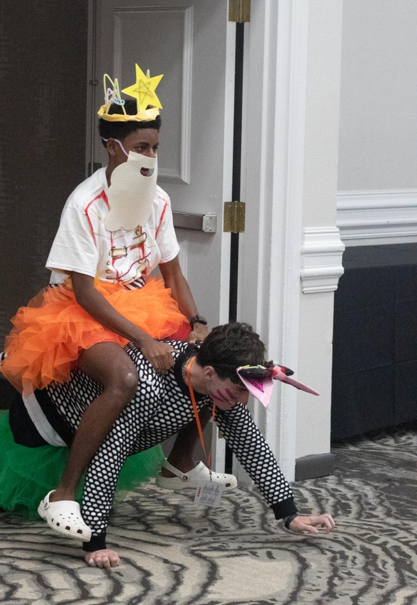 Two campers move through the runway magically. Dressed as a wizard and his unicorn steed, they made the extra effort to go just over the rainbow. 